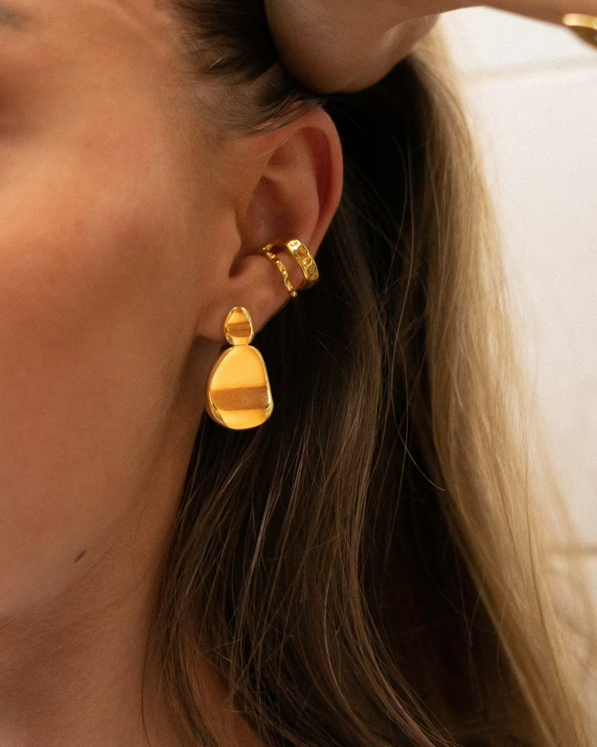 Model wearing stud earrings by Mila Online Shop, Melbourne, Australia