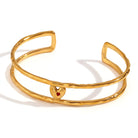 Close-up of gold heart cuff bracelet by Mila Online Shop