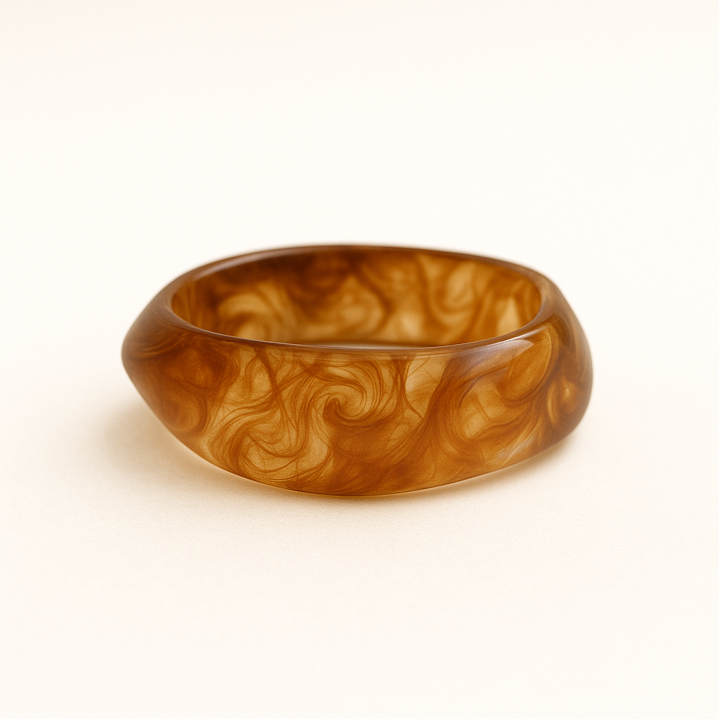 Close up of red wine coloured MA-FRIENDS RESIN BANGLE