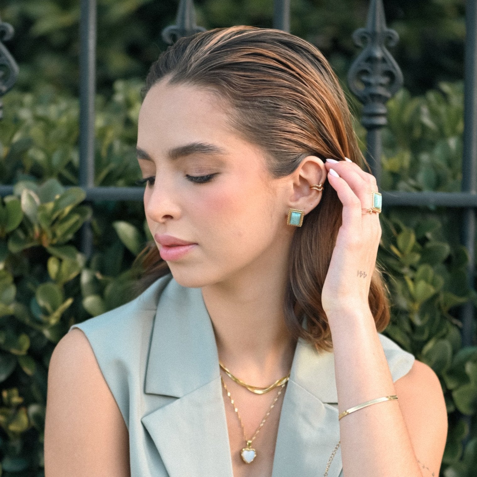Model wearing gold Ear Cuff from Mila Online Shop