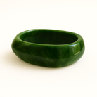 Close up of green coloured MA-FRIENDS RESIN BANGLE