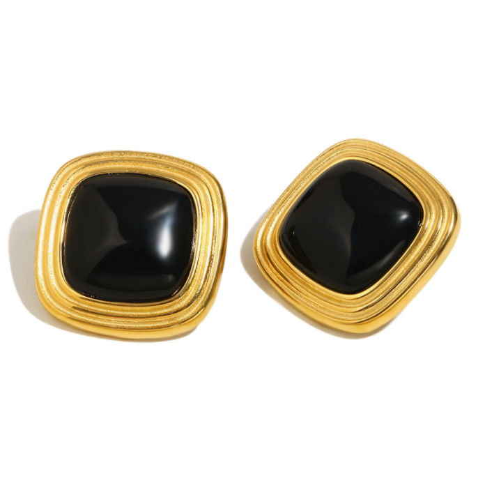 Close up of Gemstone Statement Stud Earrings in gold by Mila Online Shop. Square shaped, featuring black gemstone. Bold yet lightweight design.