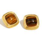 Close up of Mila Online Shop’s marble brown gemstone statement studs in gold, featuring square shape and minimalist bold style. Lightweight and elegant.