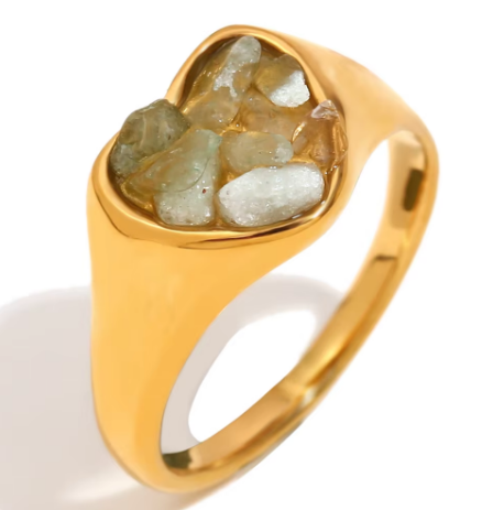 Close up of Mila Online Shop Gemstone Heart Ring in gold with green heart cut gemstone, chunky statement ring perfect for stacking with gold stackable rings