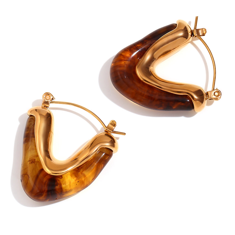 Close-up of champagne brown Mia Resin Hoops from Mila Online Shop, showcasing gold-plated detailing, sculptural design, and high-quality lightweight resin.