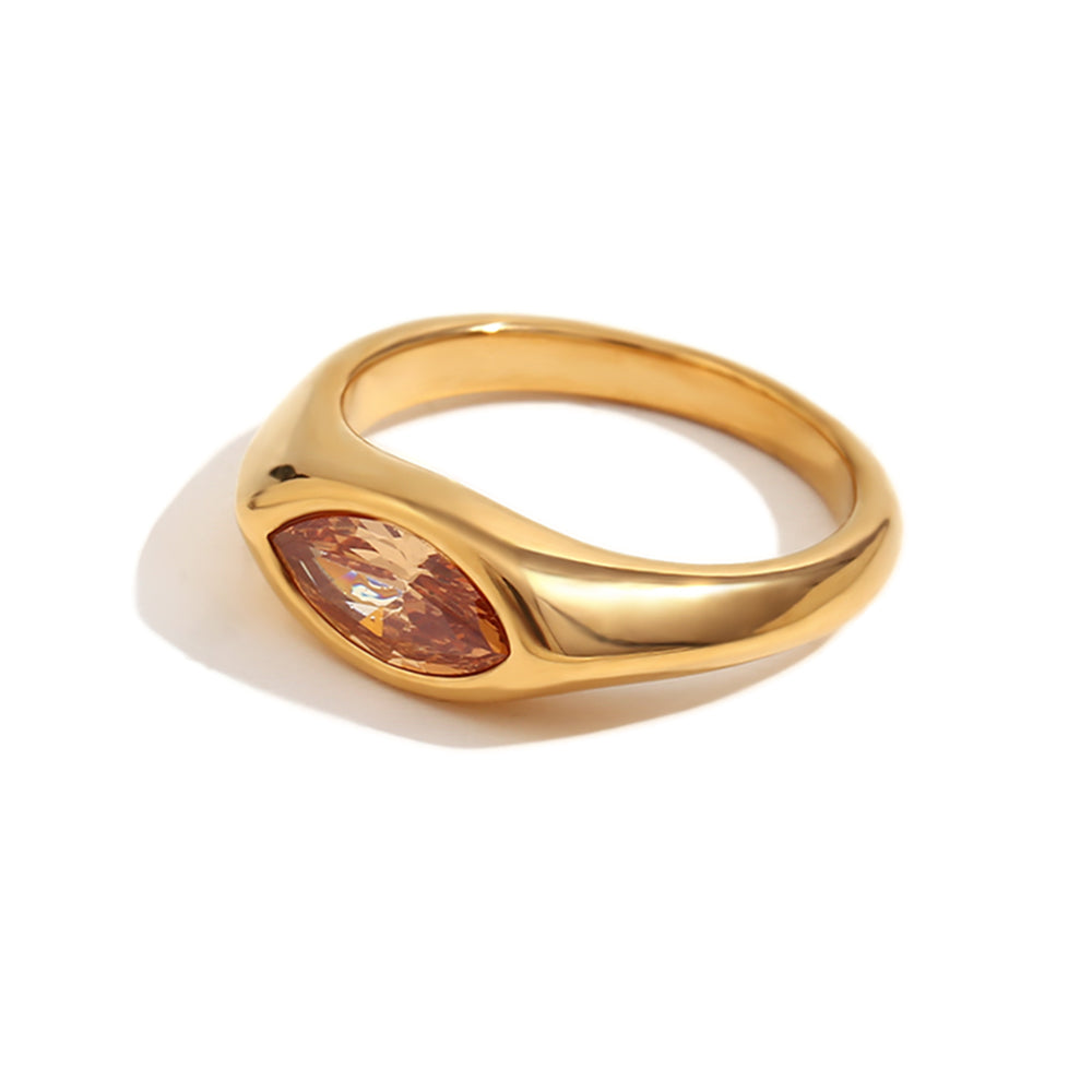 Close up of Mila Online Shop Millie Zirconia Cubic Ring with brilliant pink zirconia stone in gold, elegant gemstone statement ring for stacking.